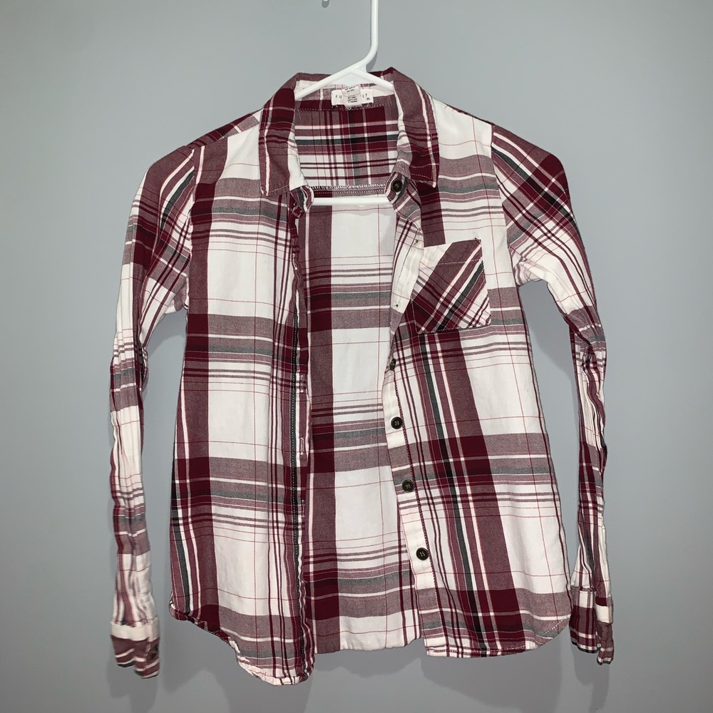 a maroon and white flannel